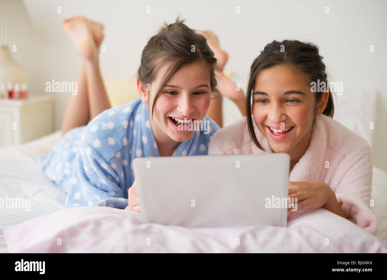 Girls looking at laptop Stock Photo