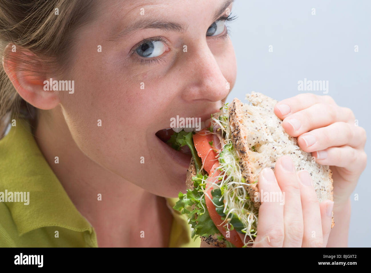 Young Woman Eating Sausage Sandwich Hi res Stock Photography And Images 