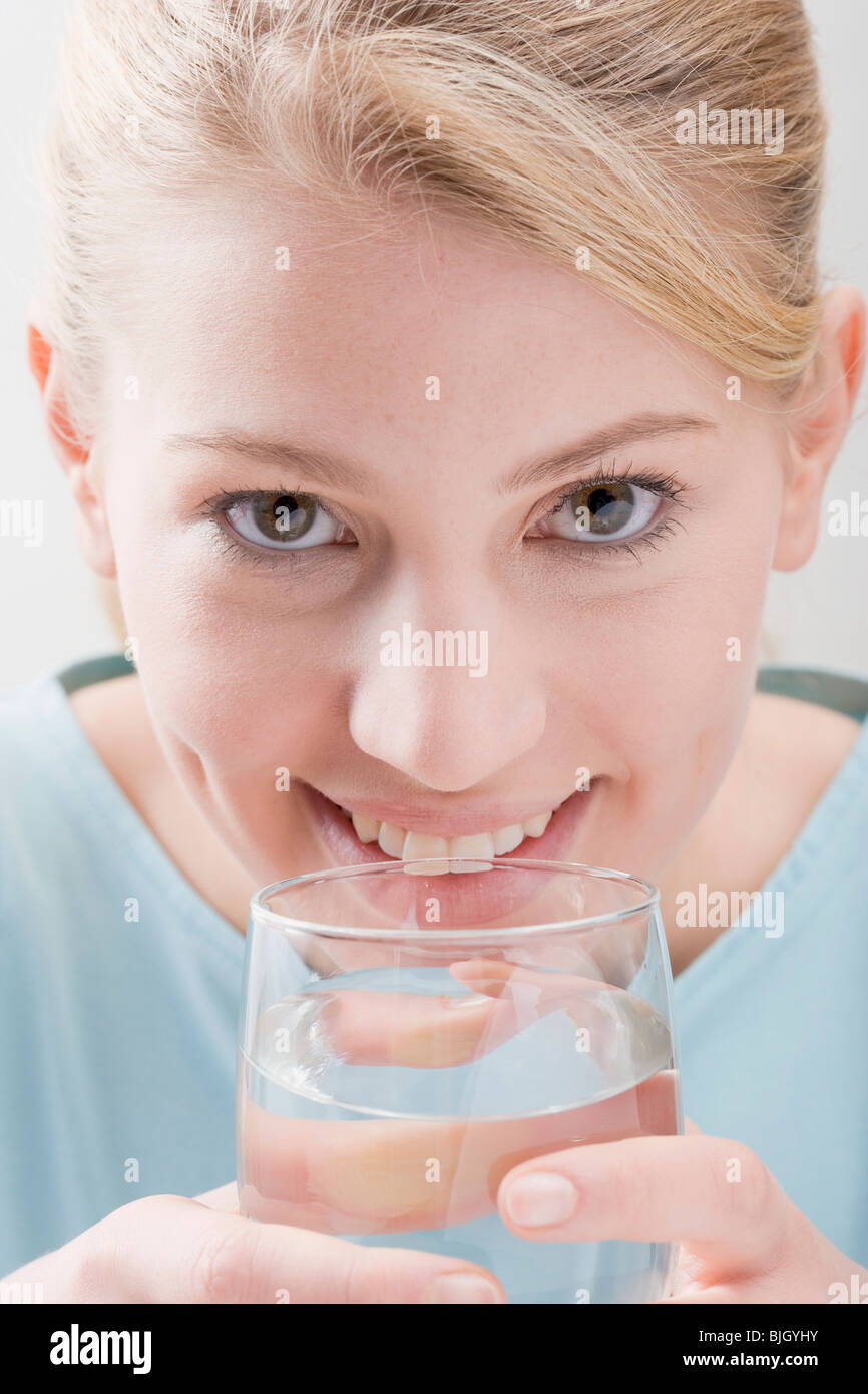 Woman with glass of water - Stock Photo