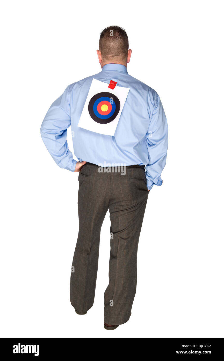 A businessman with a bulls eye taped to his back. Stock Photo