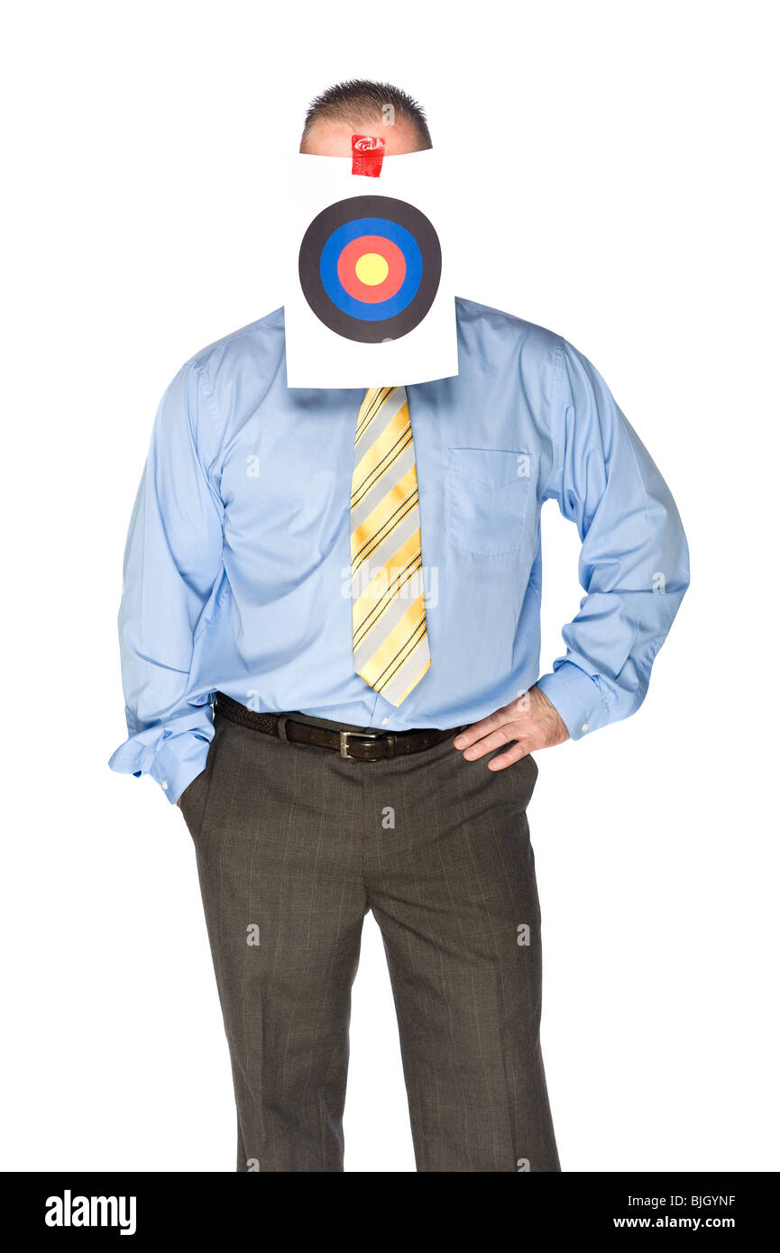 A businessman with a bulls eye taped on his forehead Stock Photo