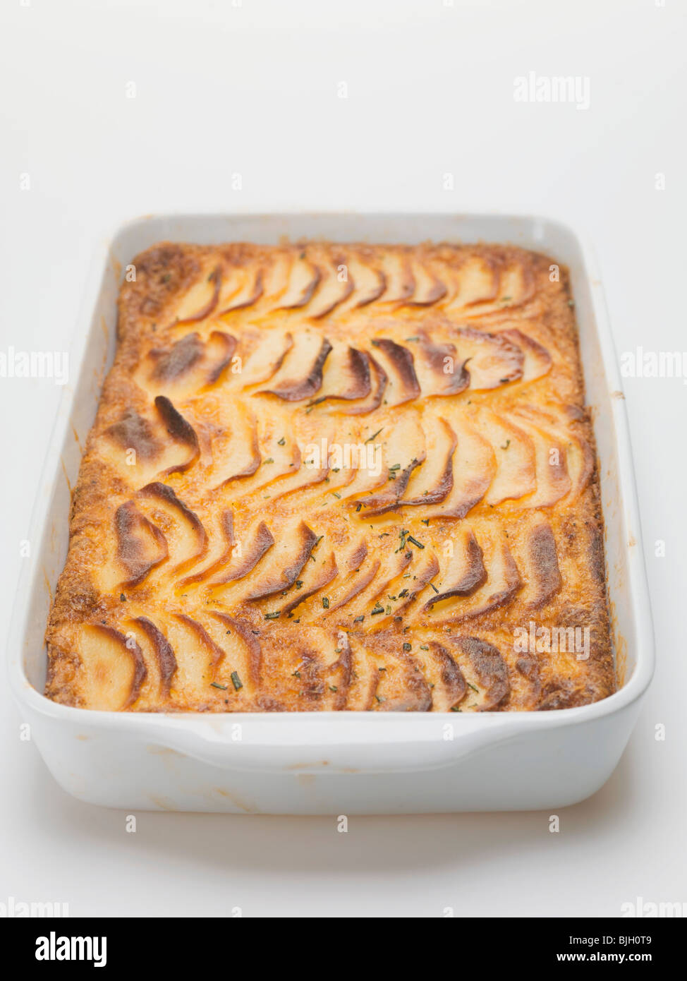 Potato gratin in baking dish Stock Photo Alamy