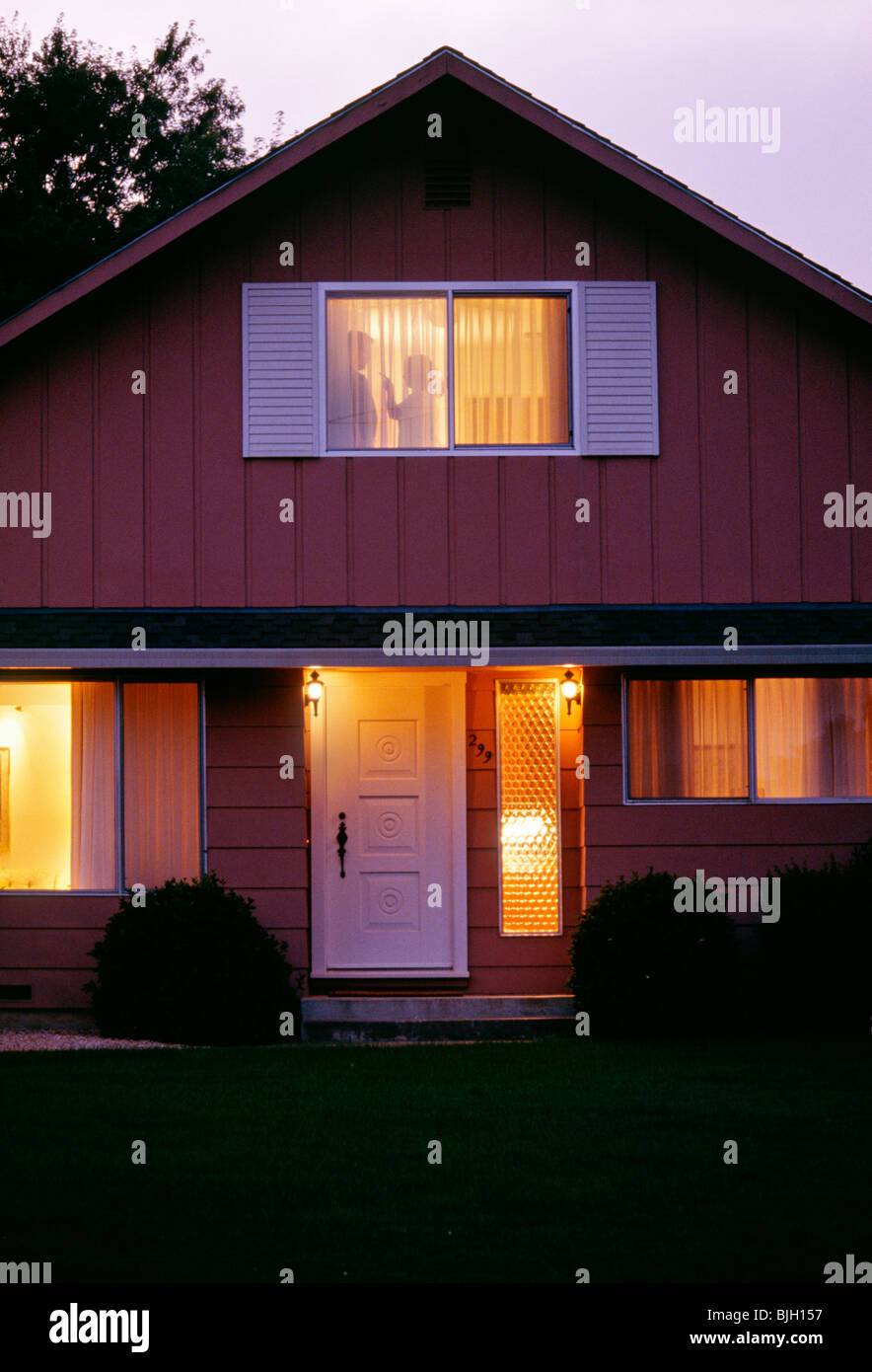 Couple Arguing in Suburban Home Stock Photo