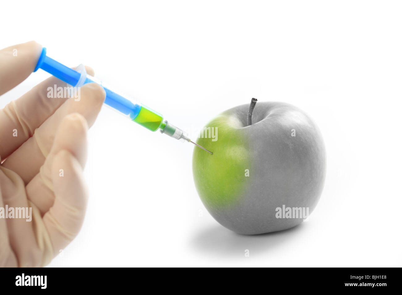 Mac Injection injection vitamin in apple Stock Photo - Alamy