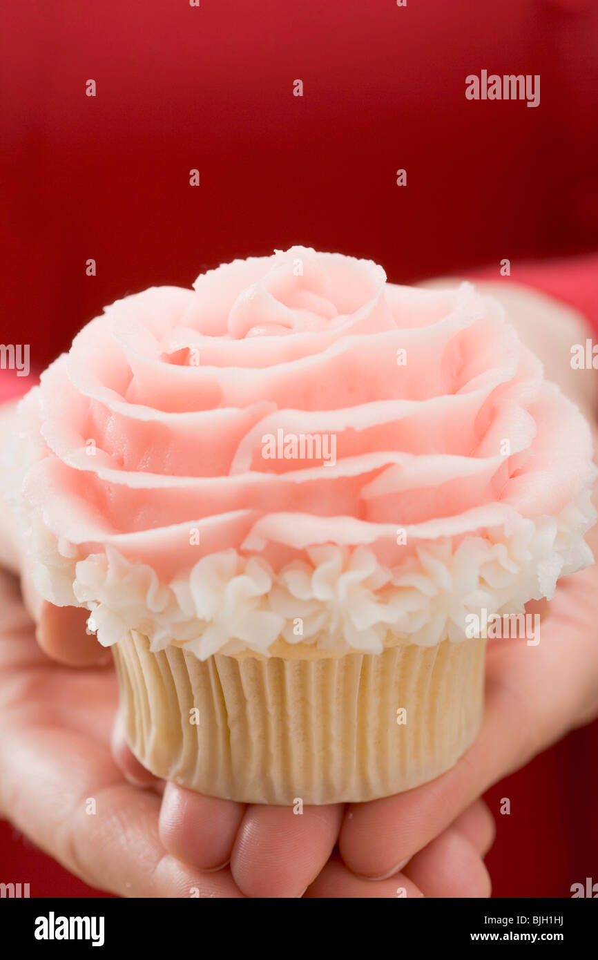 Hands holding cupcake Stock Photo Alamy
