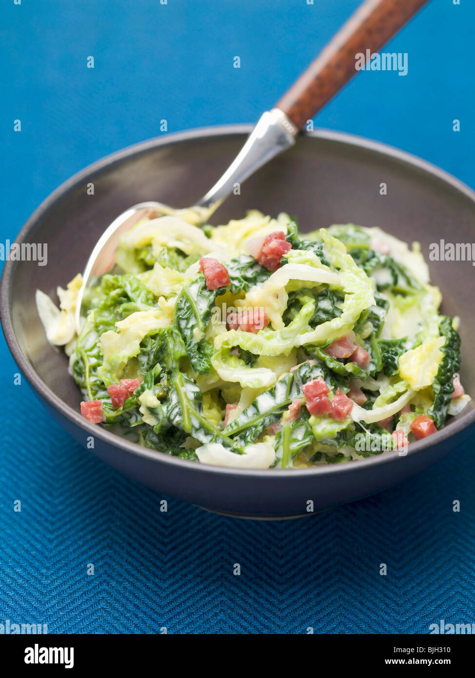 Savoy cabbage with bacon Stock Photo Alamy