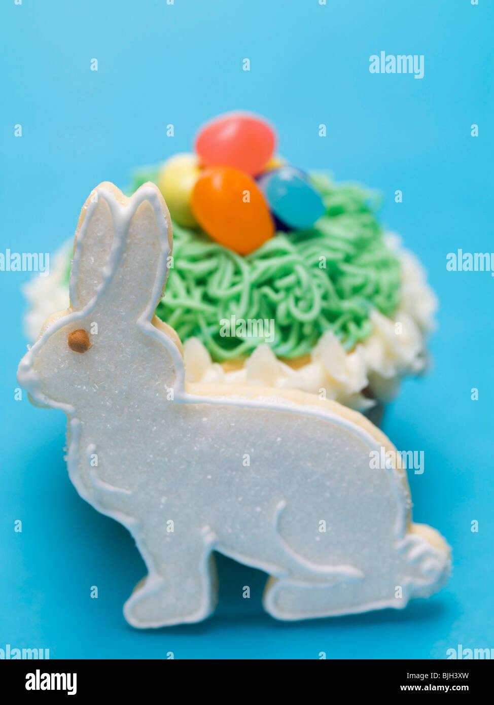 Cupcake with jelly beans and Easter Bunny Stock Photo Alamy