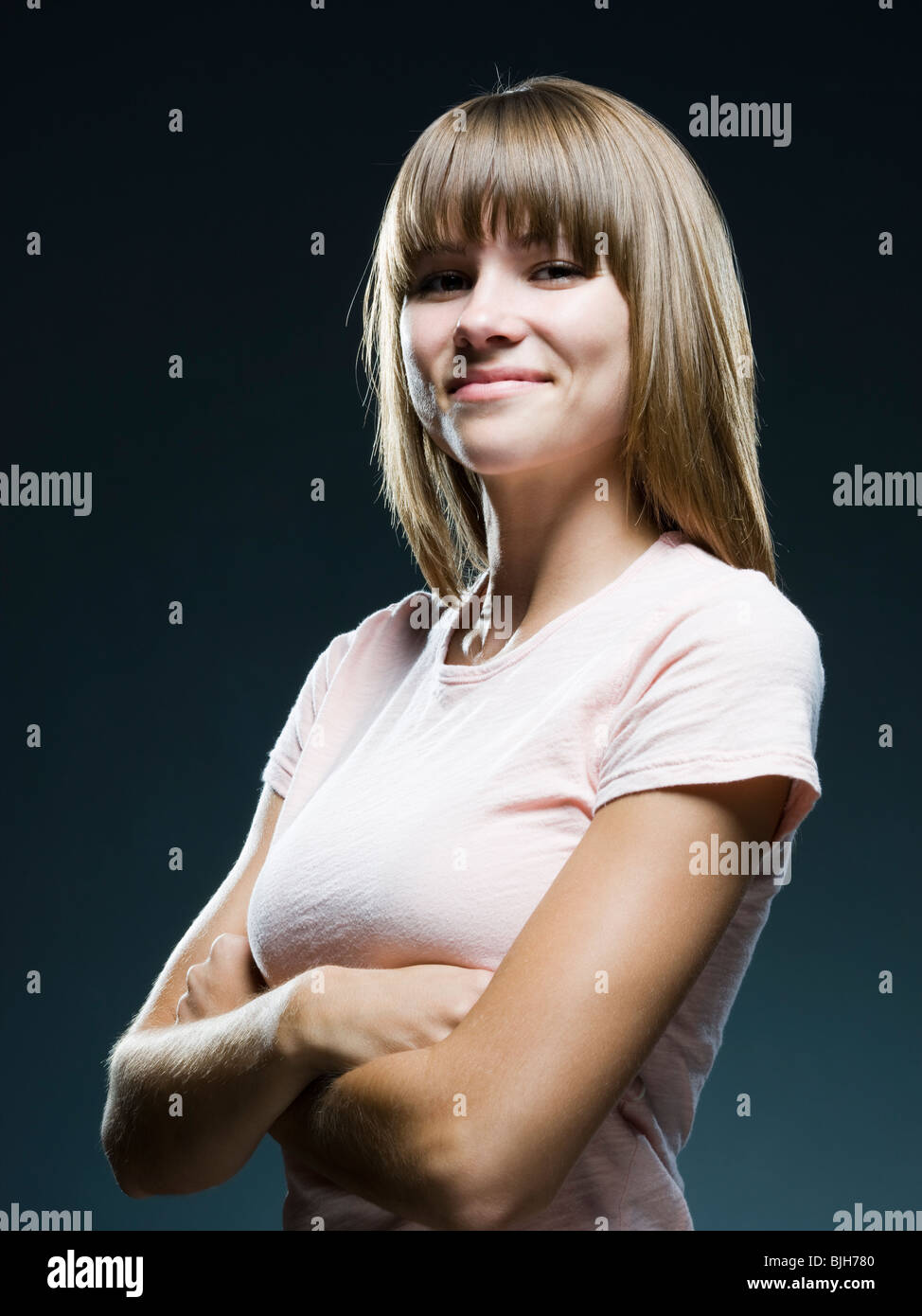 woman with arms crossed Stock Photo