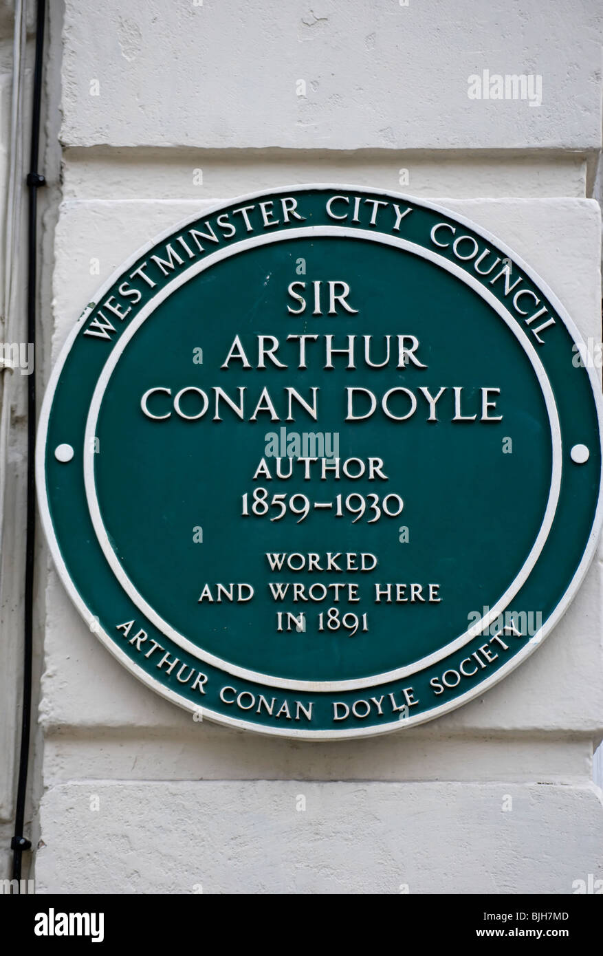 plaque marking a home of writer sir arthur conan doyle, creator of sherlock holmes, in upper
