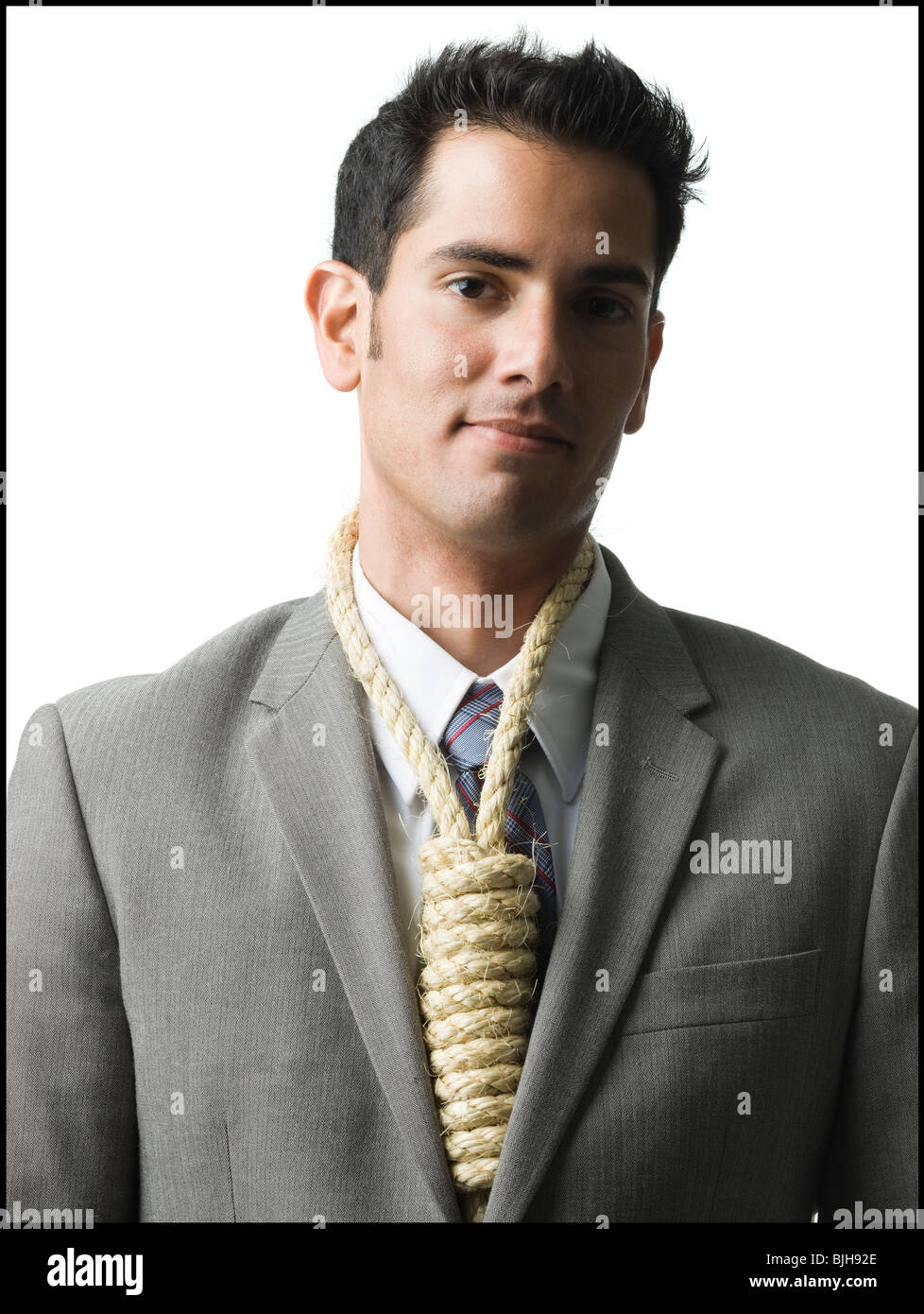 businessman with hangman's noose around his neck Stock Photo