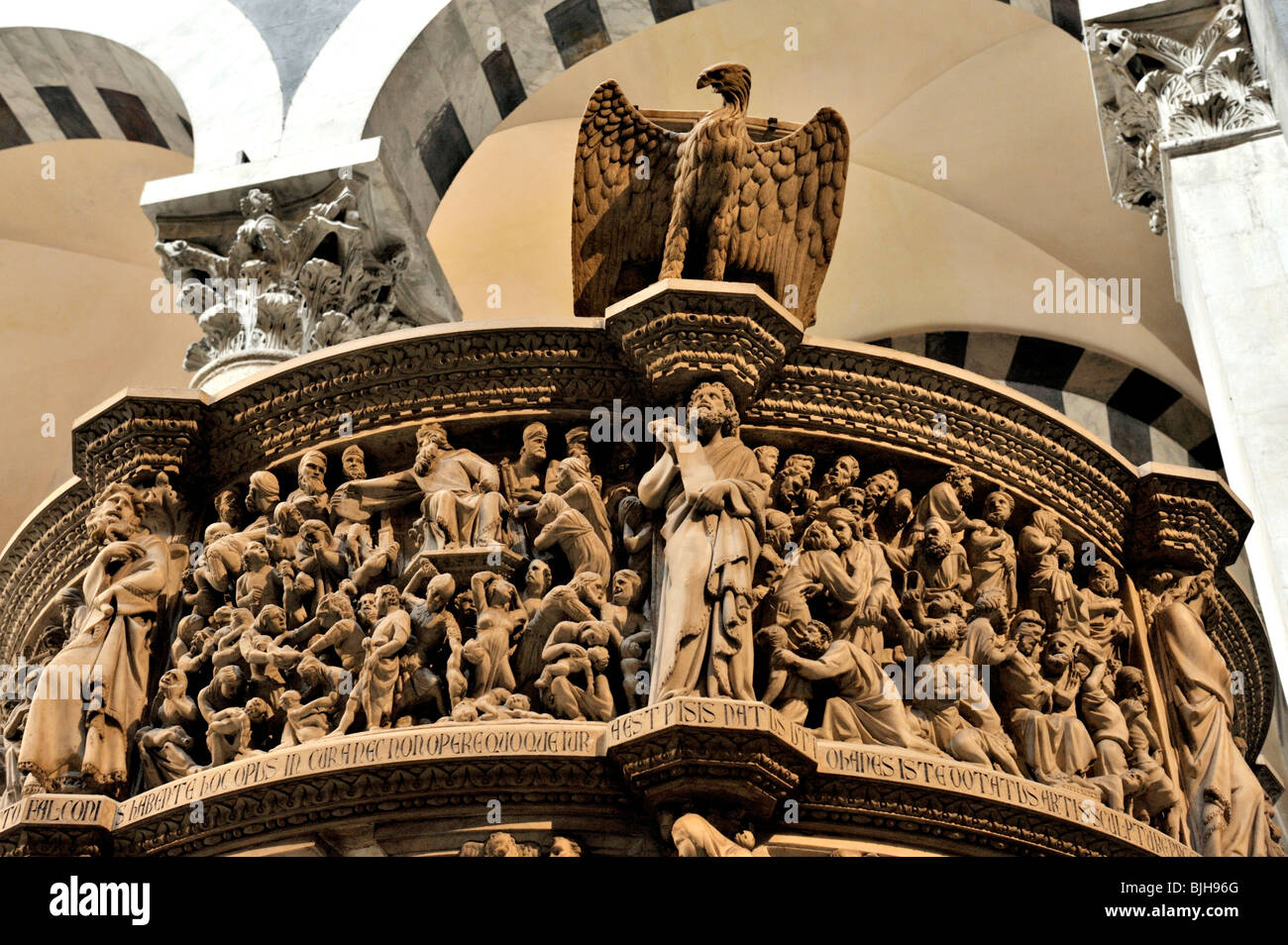 Famous 14 C Italian Renaissance carved stone pulpit by Giovanni Pisano in Pisa Duomo cathedral, Tuscany, Italy Stock Photo