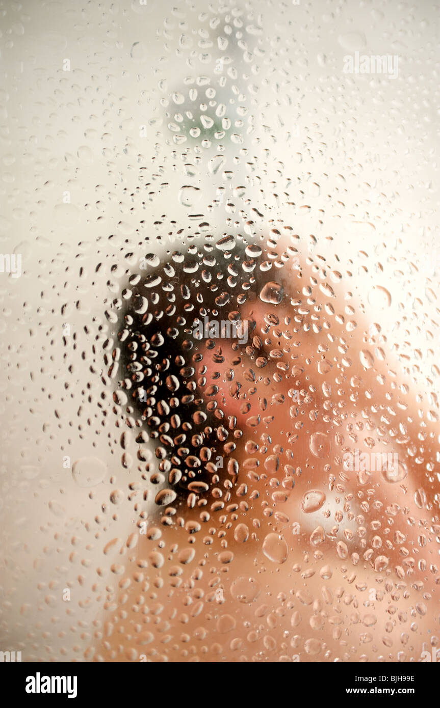 Woman taking hot shower Stock Photo Alamy