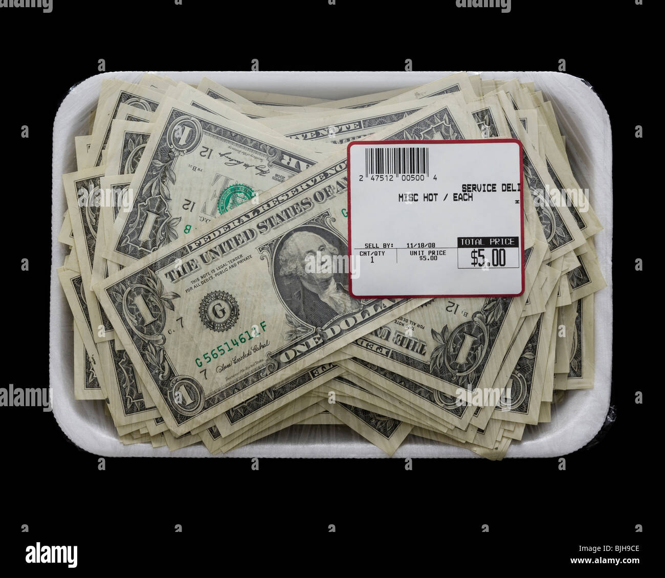 us dollars in a supermarket shrinkwrap package Stock Photo Alamy