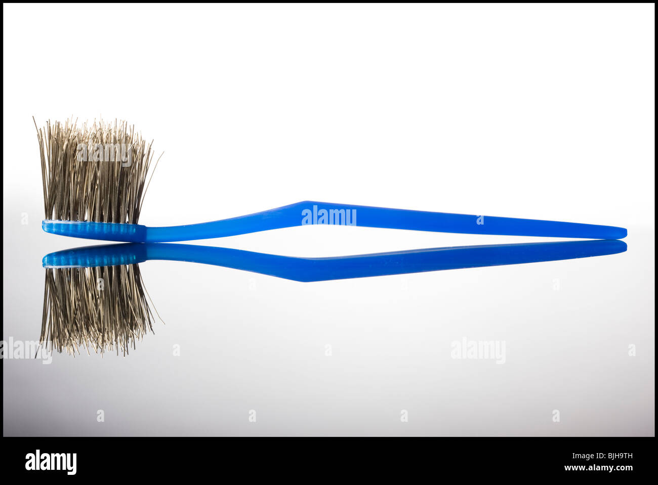 toothbrush with the bristles made of metal wires Stock Photo Alamy