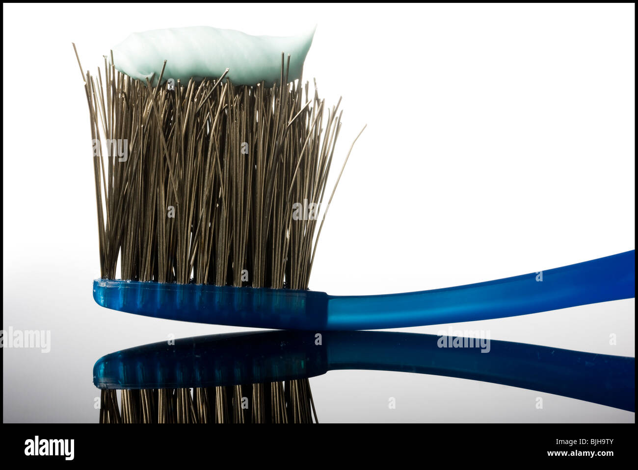 toothbrush with the bristles made of metal wires Stock Photo Alamy