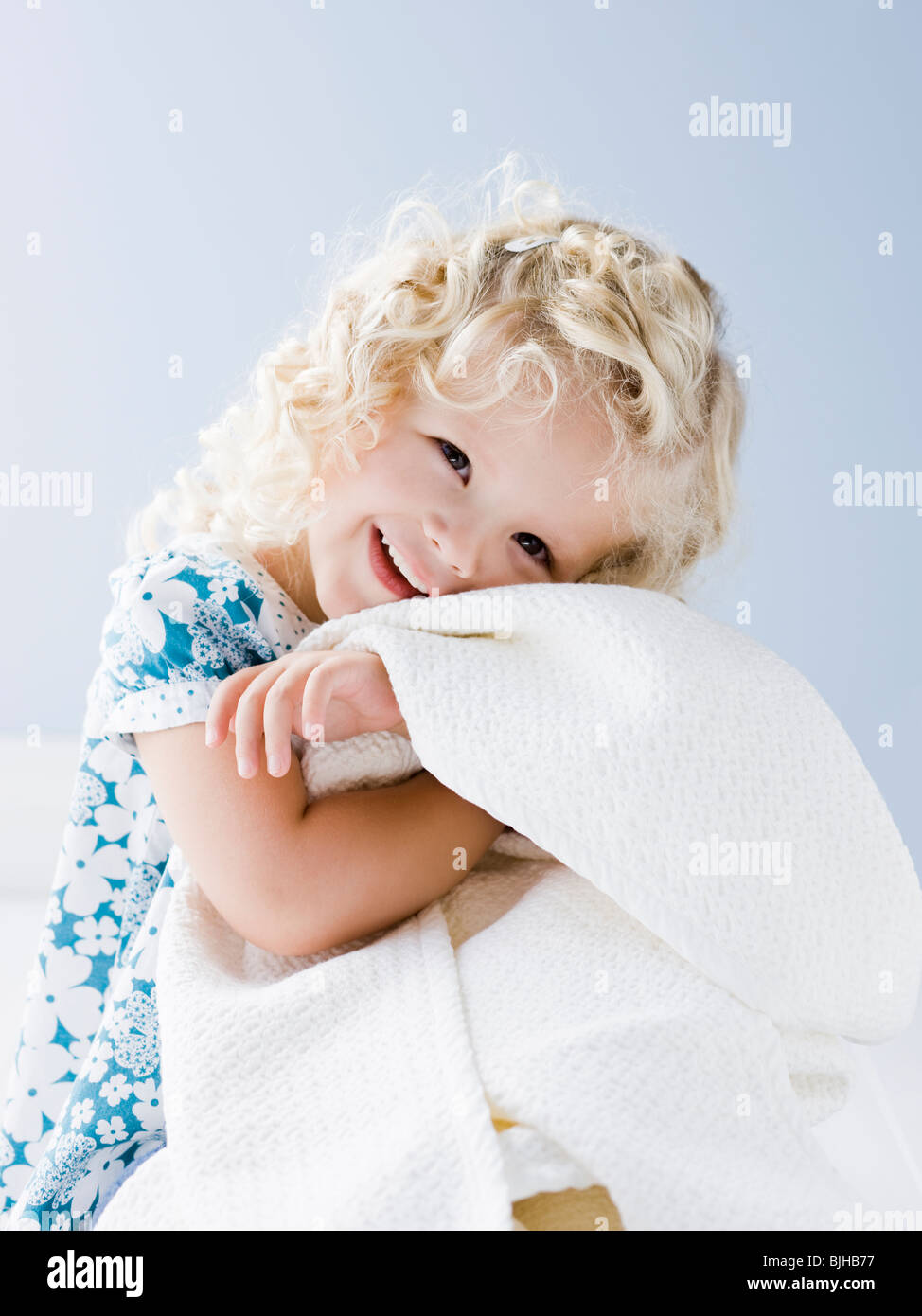 little girl holding her blanket Stock Photo Alamy