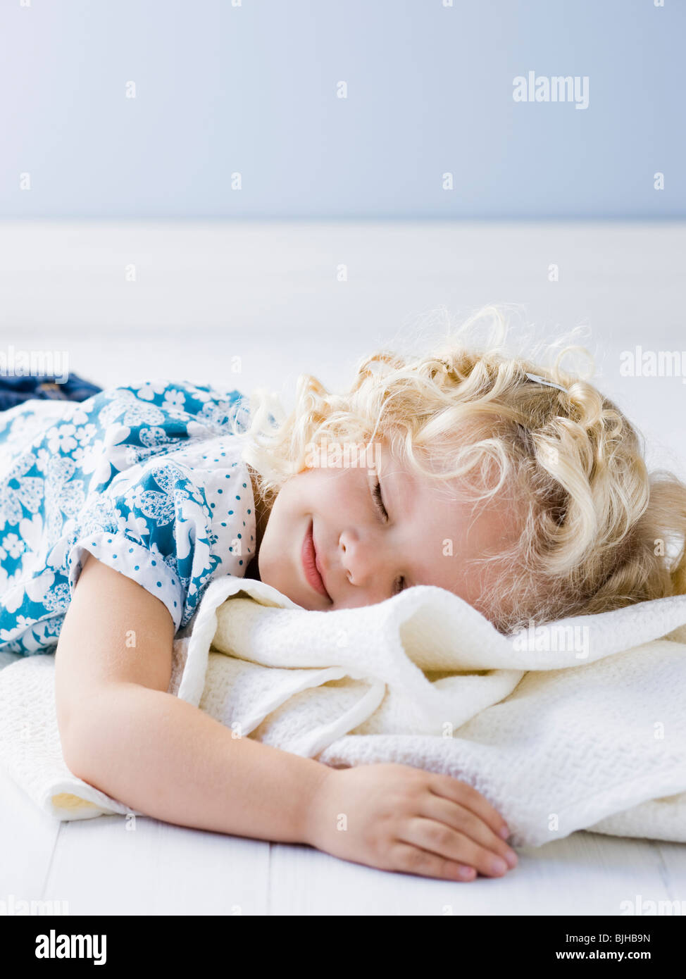 little girl holding her blanket Stock Photo Alamy