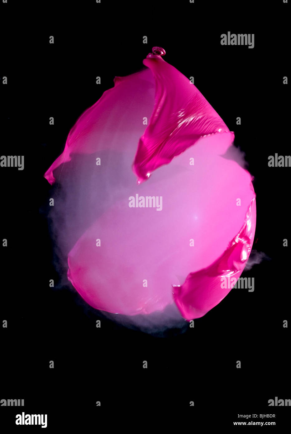 Bursting red balloon hi-res stock photography and images - Alamy