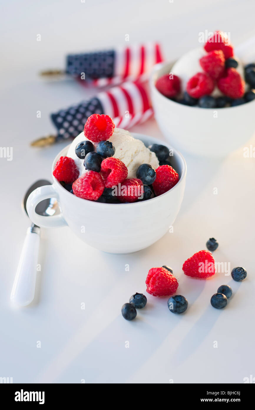 Bowls of ice cream and fruit Stock Photo