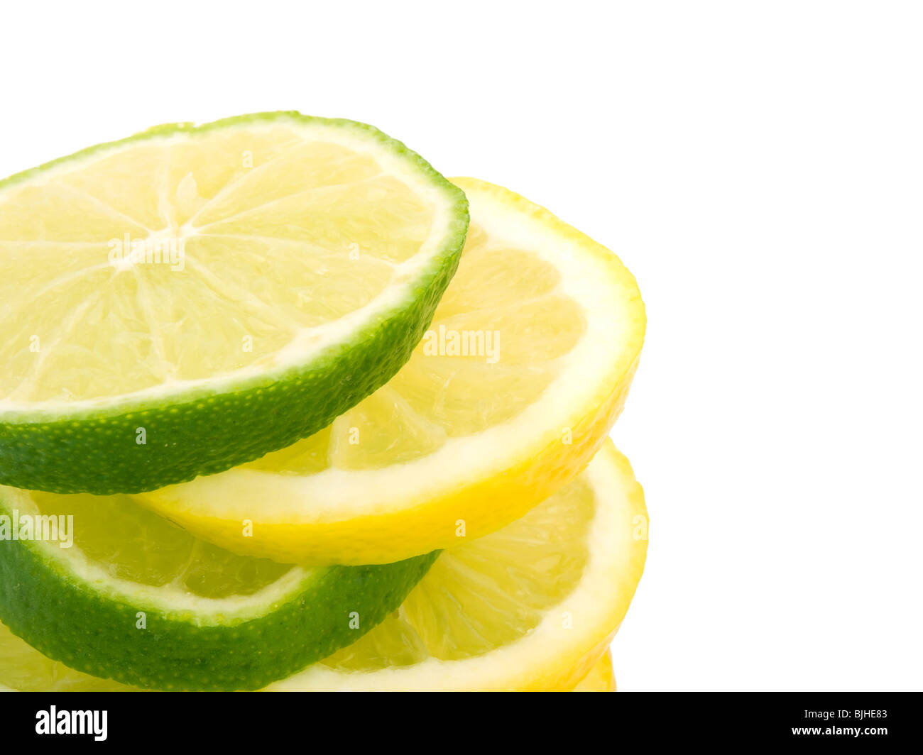 Closeup picture of lemon and lime slices on white background Stock Photo