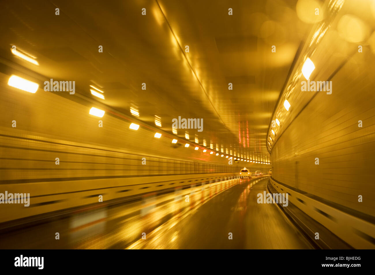 Cars driving in a tunnel Stock Photo