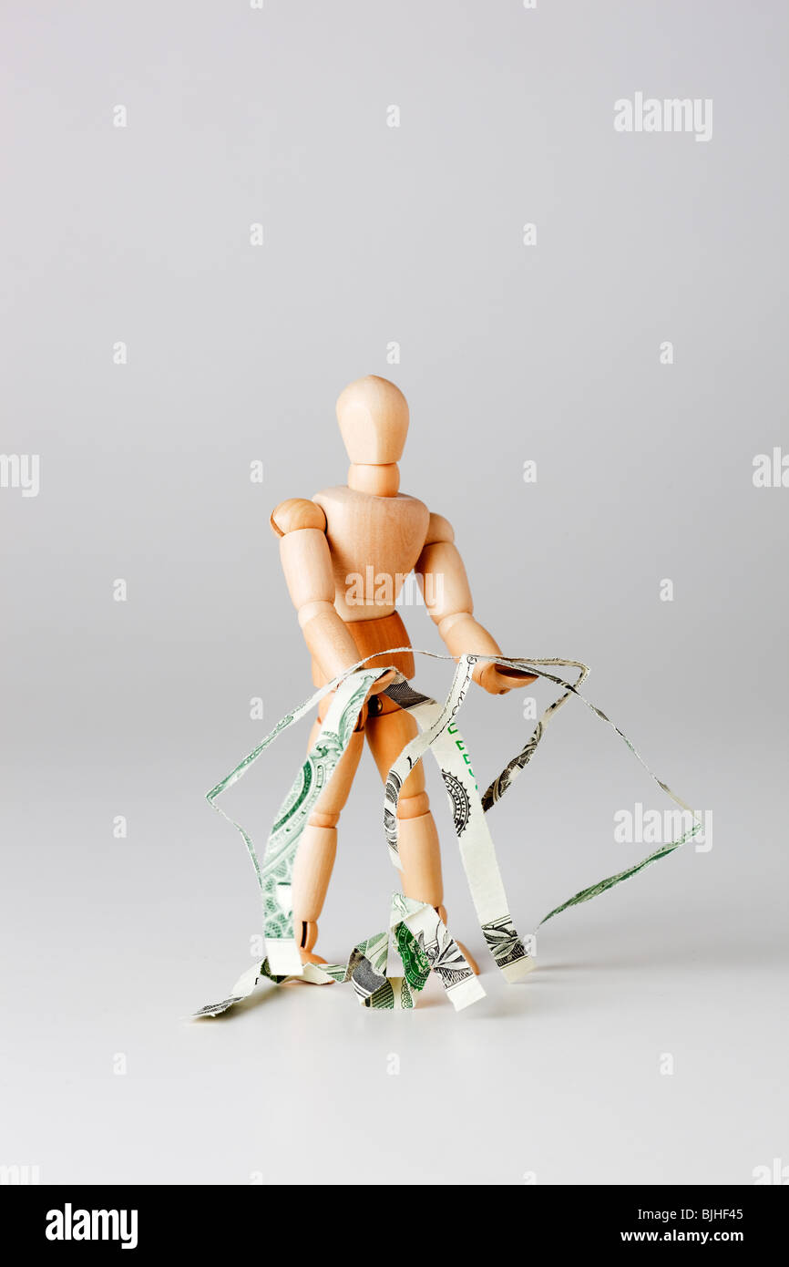 mannequin with shredded money Stock Photo