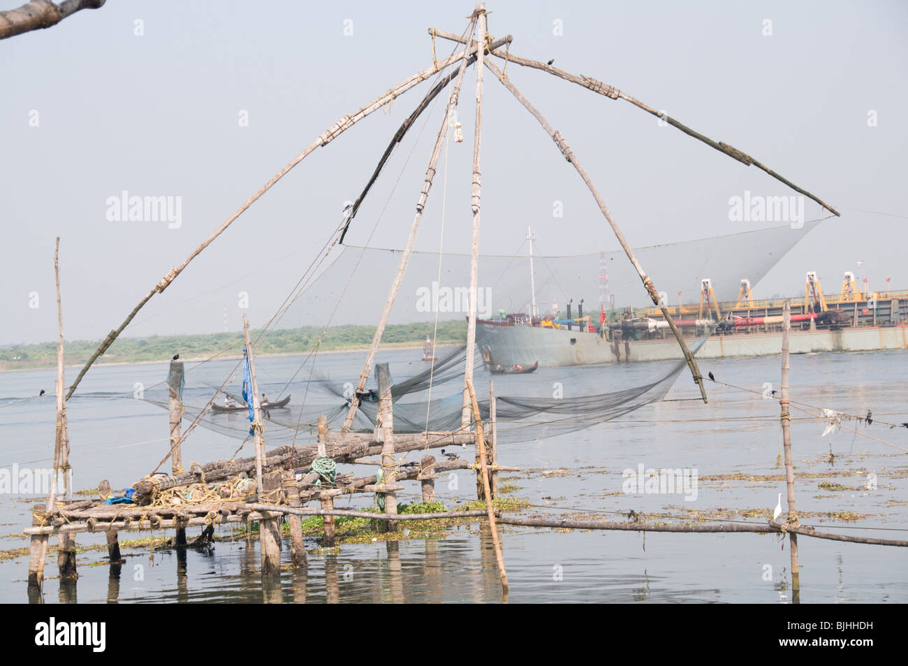 Chinese fishing net on the beach at Fort Kochi, Kochi, Kerala, India Stock Photo