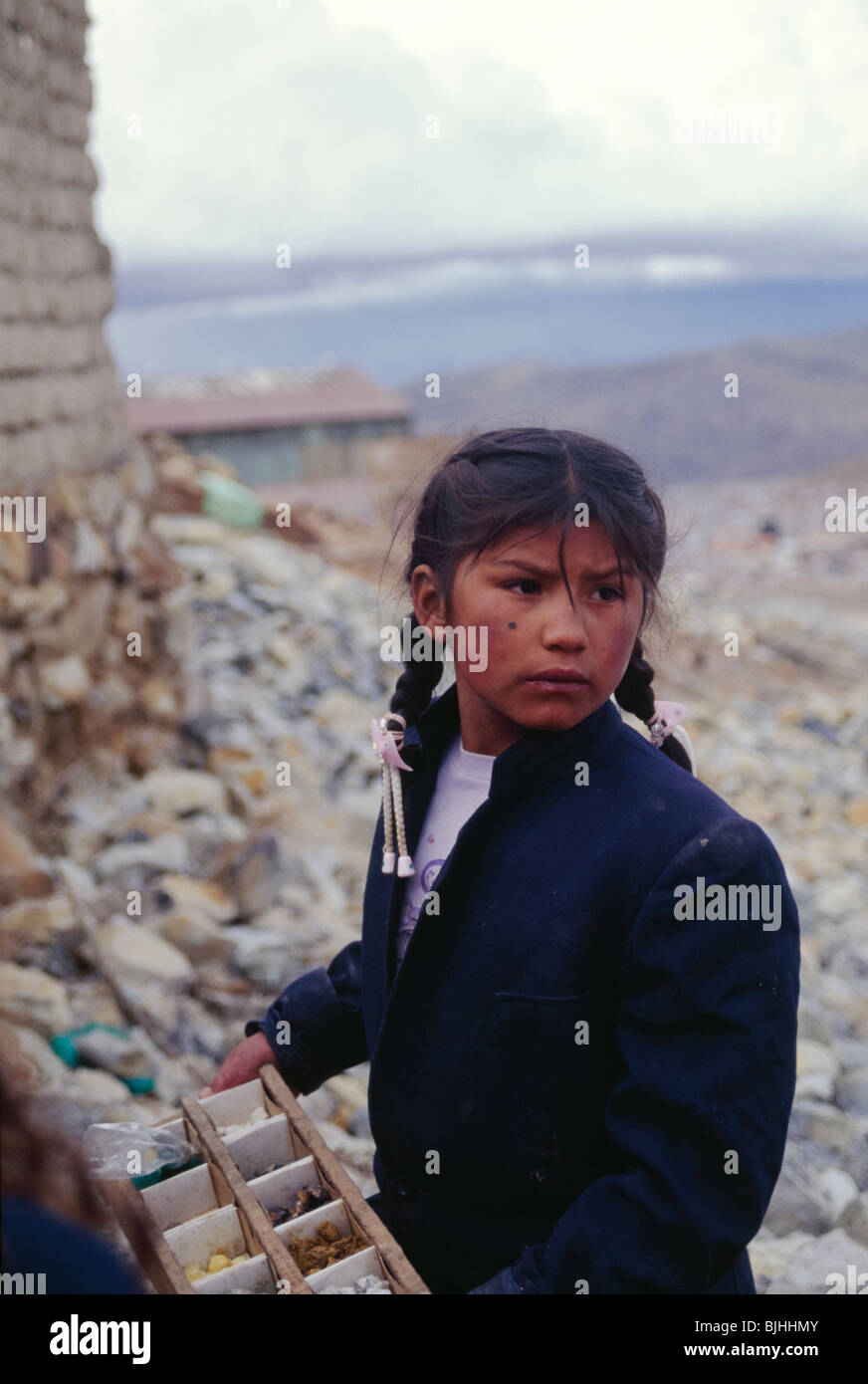 Girl Selling Rocks in Potosi Stock Photo - Alamy