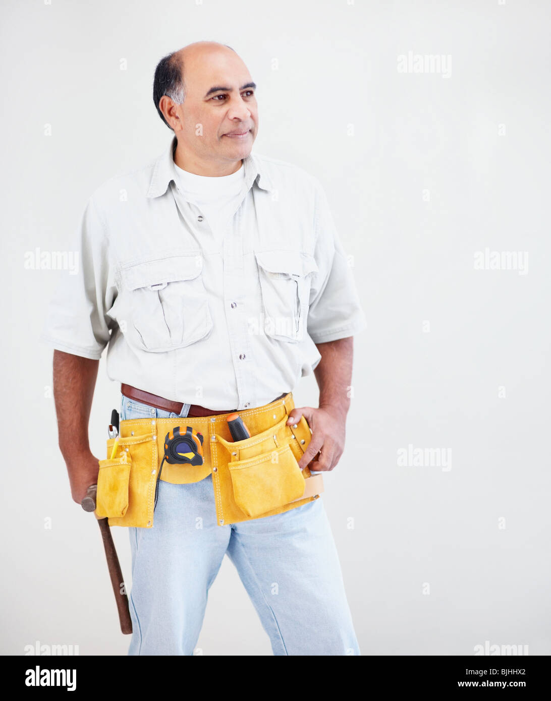 Man wearing tool belt Stock Photo Alamy