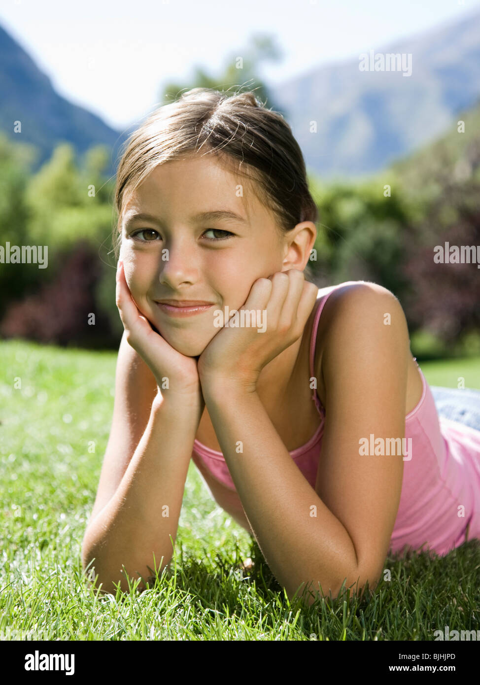 girl lying on the grass in the park Stock Photo - Alamy