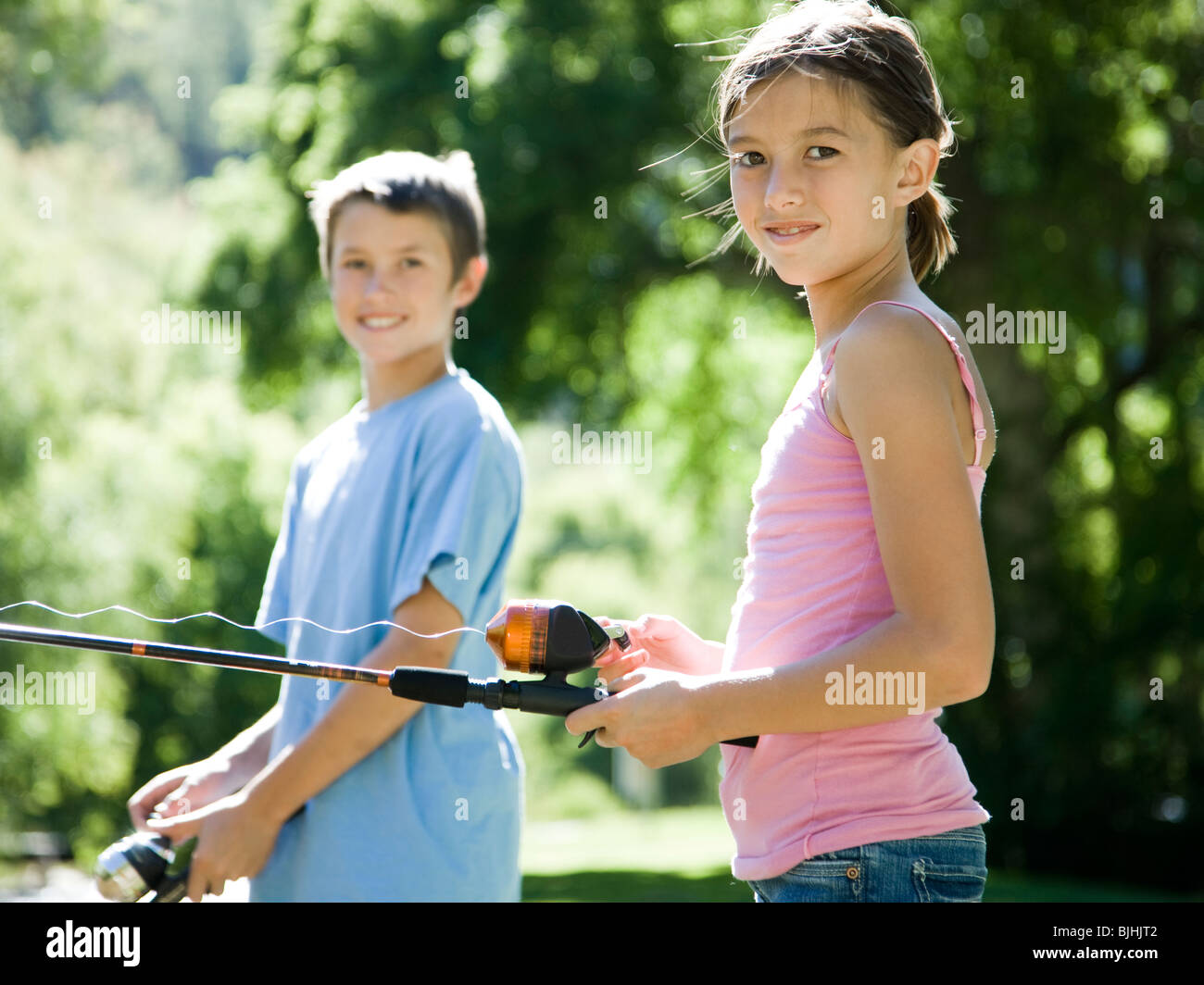 brother and sister fishing Stock Photo Alamy
