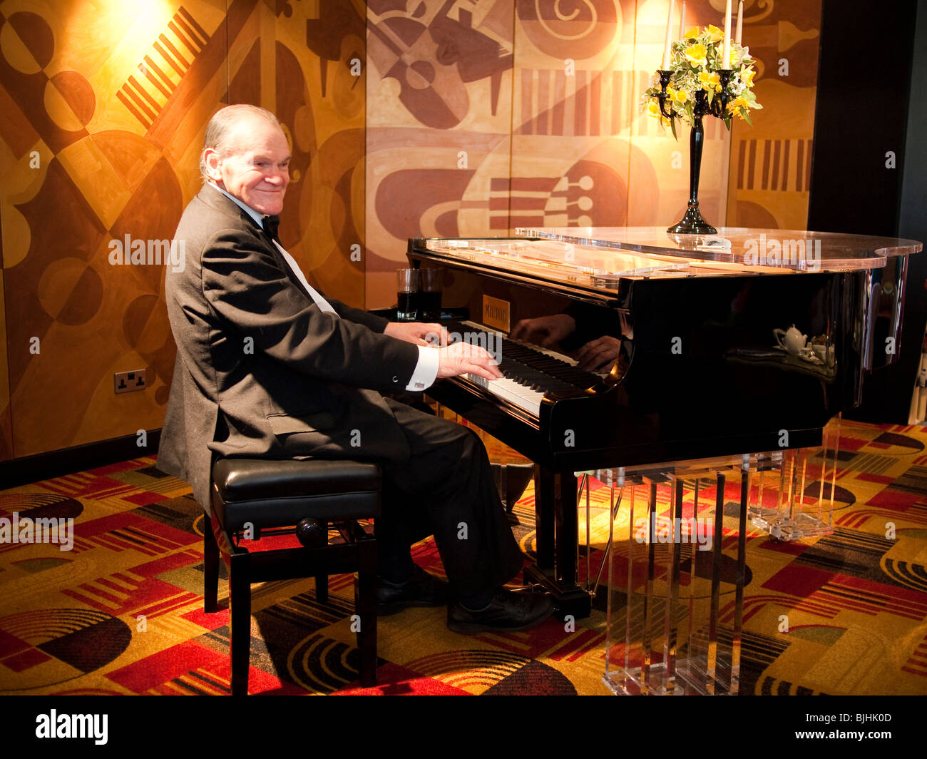 Pianist at Grand Piano Stock Photo