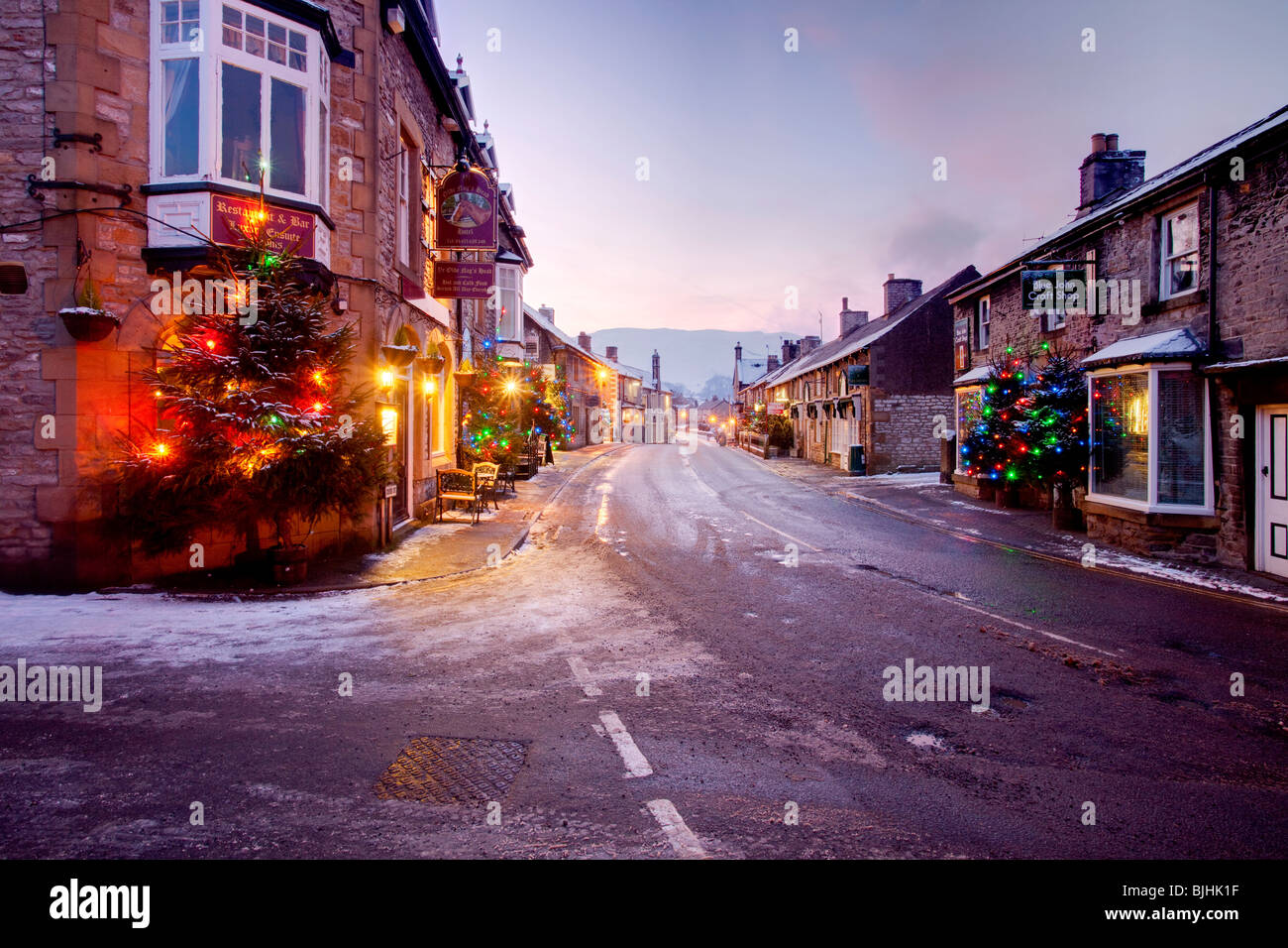 Christmas lights in Castleton at dusk in the Peak District national Park Stock Photo