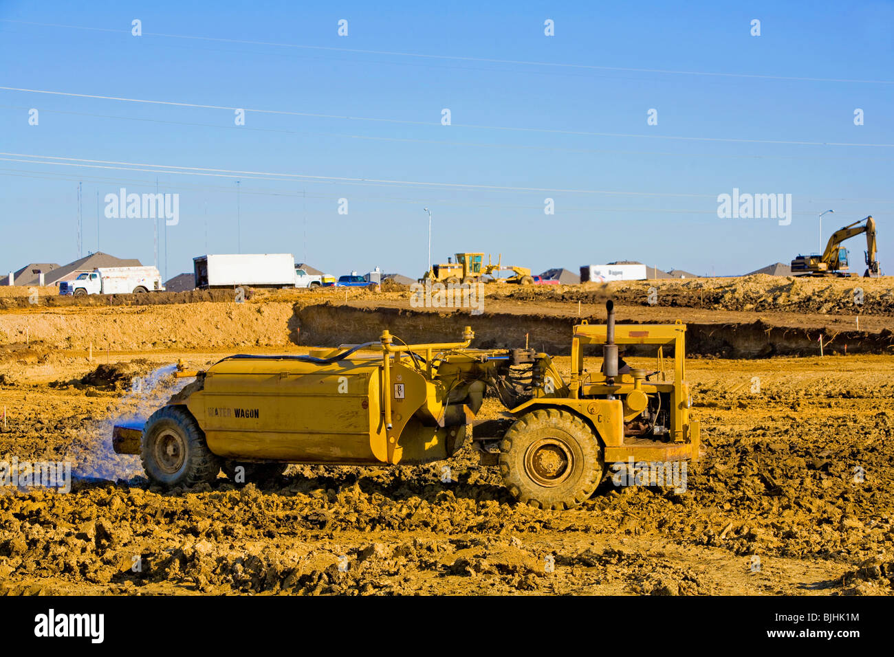 Construction equipment and personnel required for subdivision construction Stock Photo