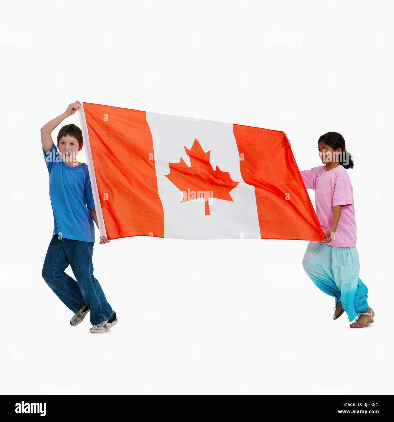 Children carrying Canadian flag Stock Photo