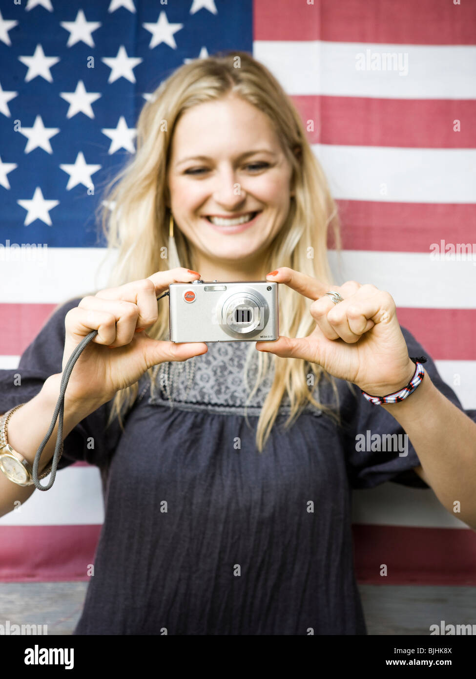 woman taking a picture with a digital camera Stock Photo Alamy