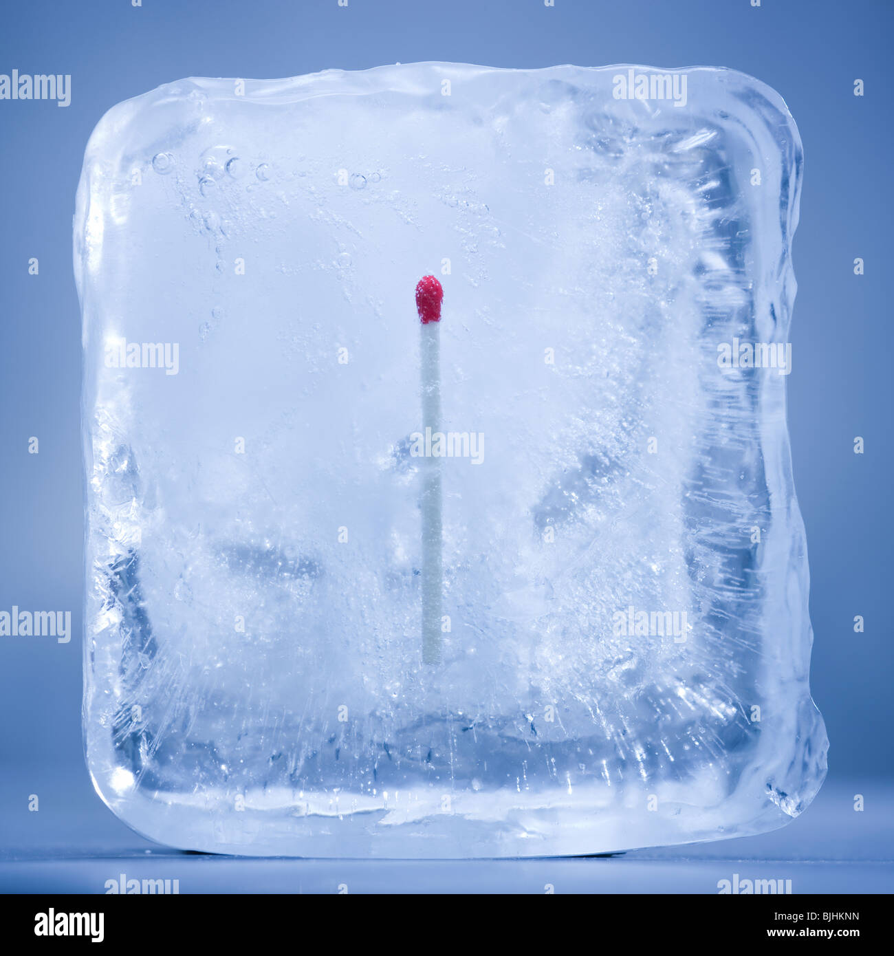 match frozen in a block of ice Stock Photo