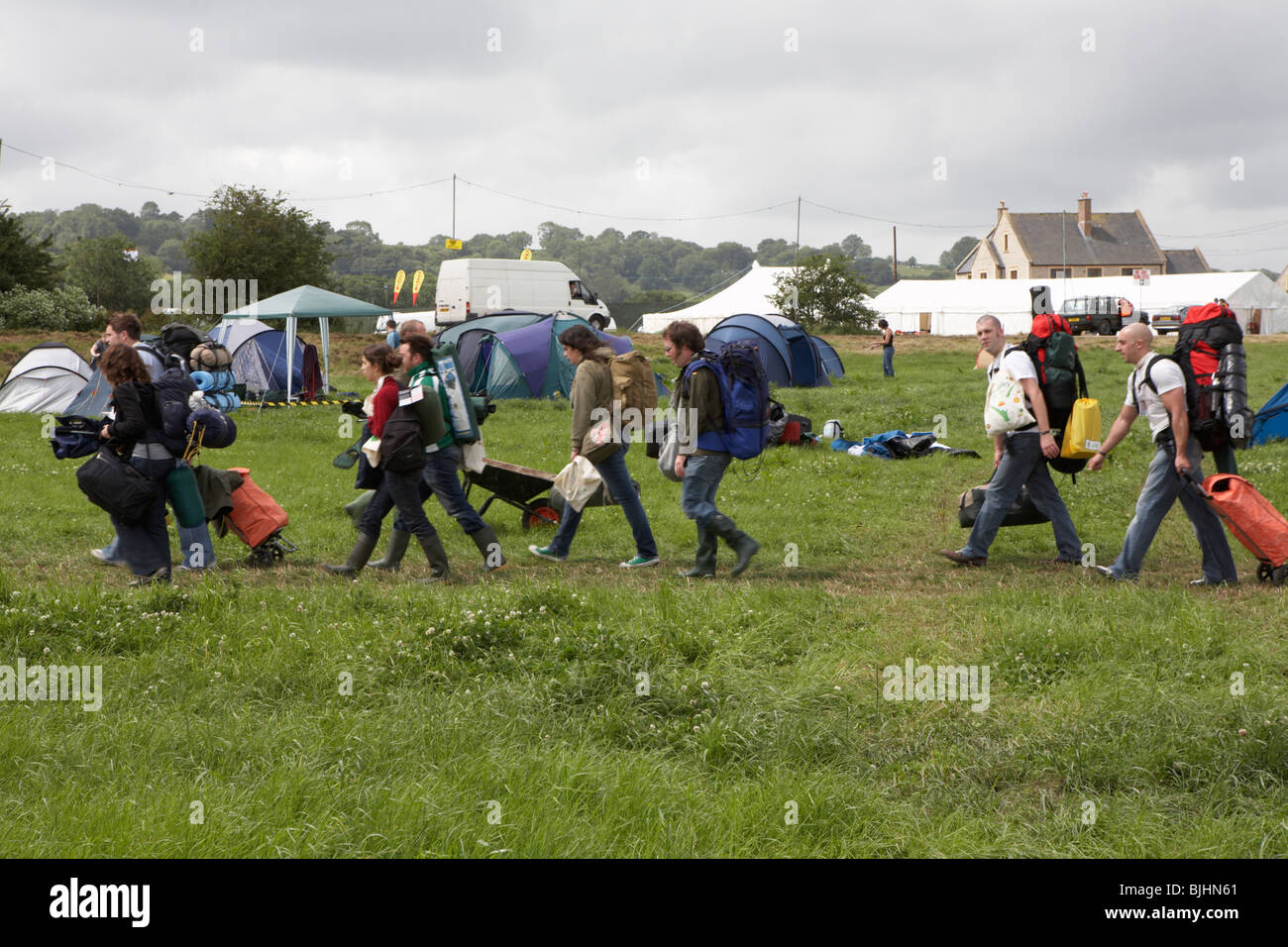Revelers arrive on site at Glastonbury Festival 2007 with all their