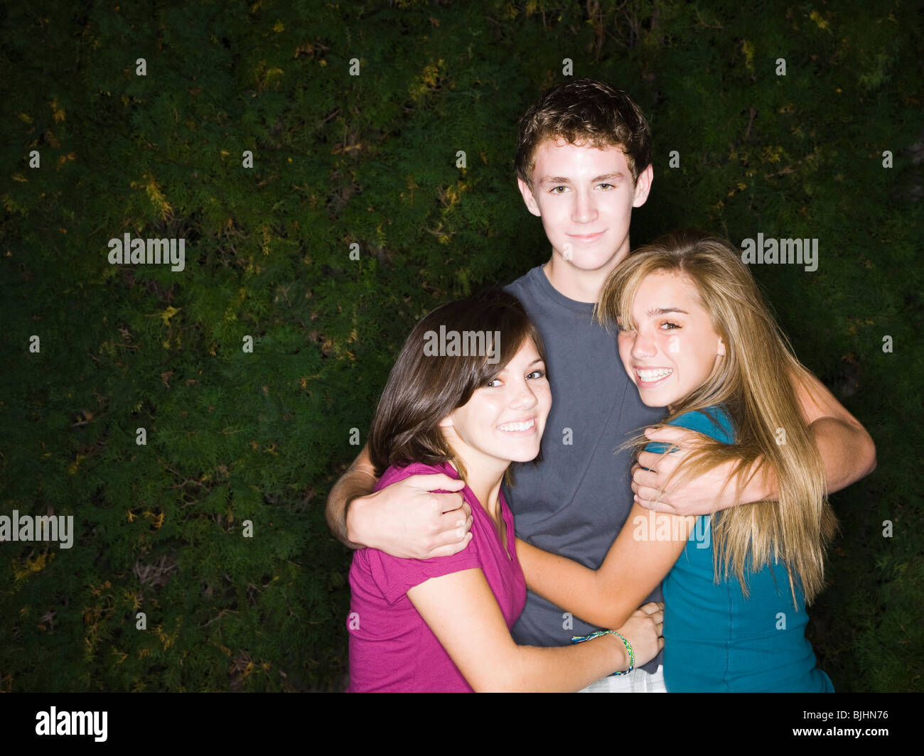 teenage boy and two