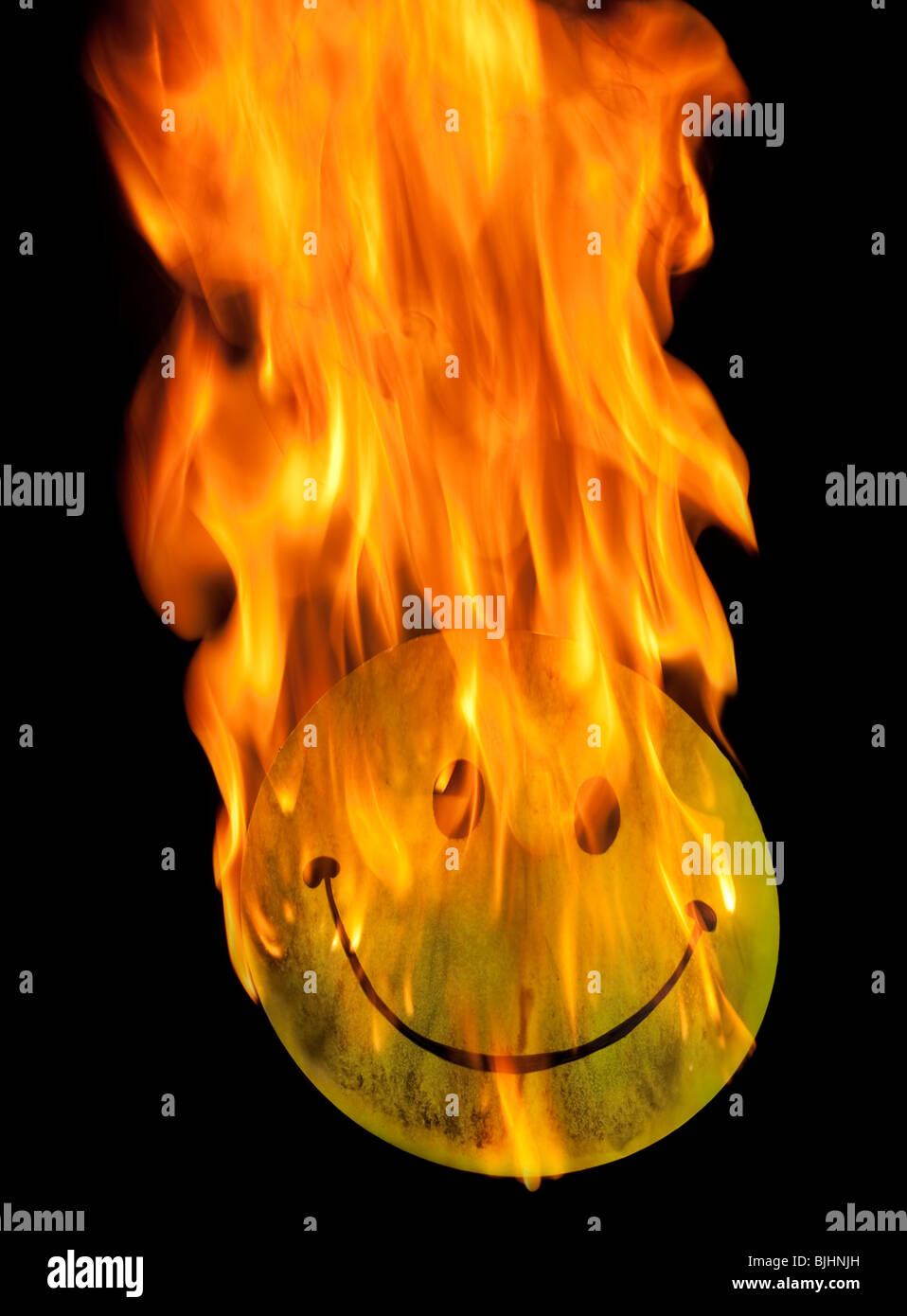 happy face on fire Stock Photo