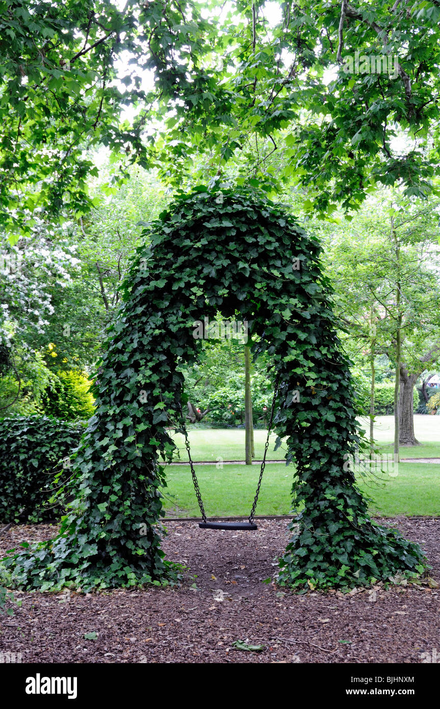 Ivy covered swing in Paultons square Chelsea London England Britain UK Stock Photo