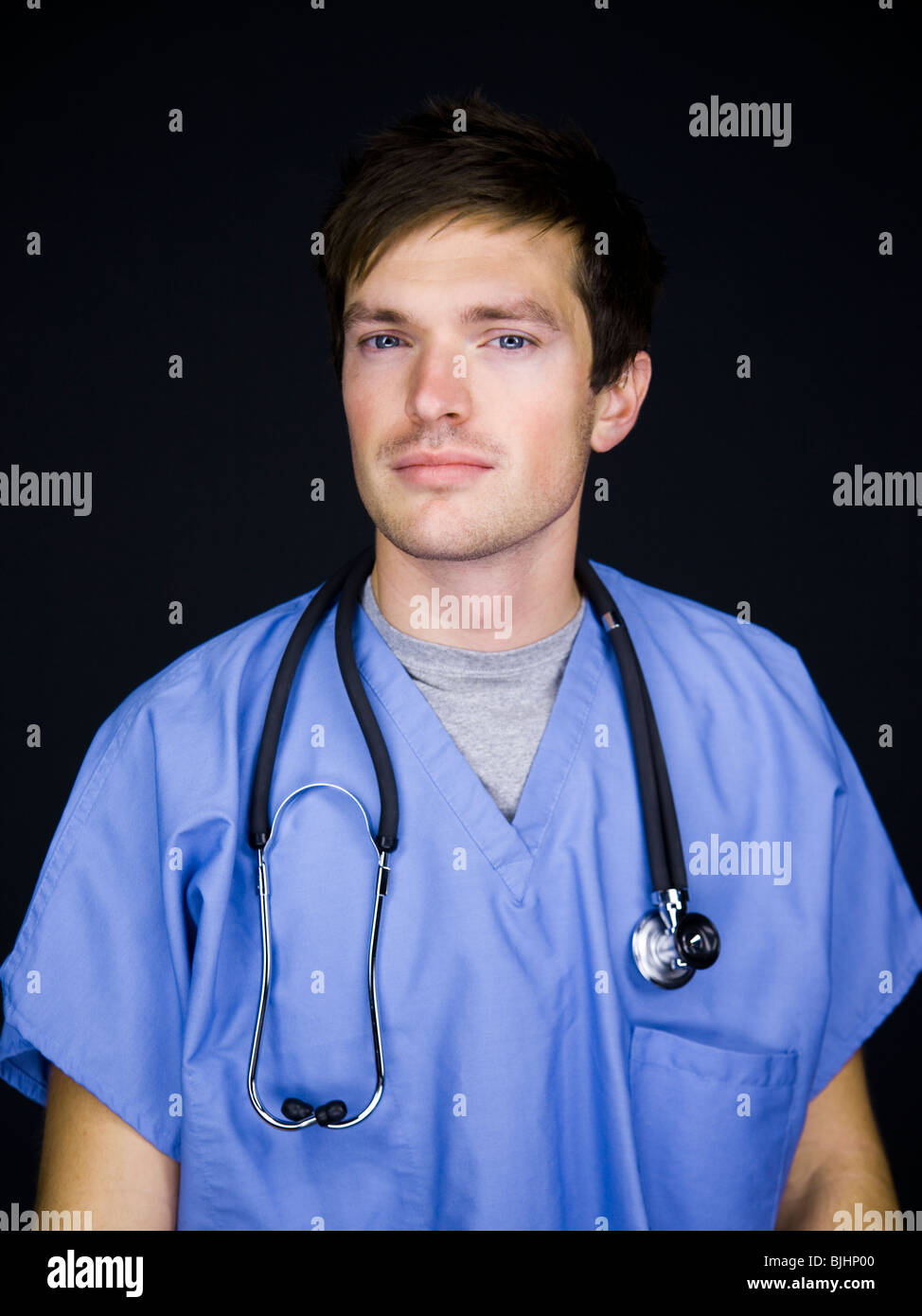 doctor wearing scrubs Stock Photo Alamy