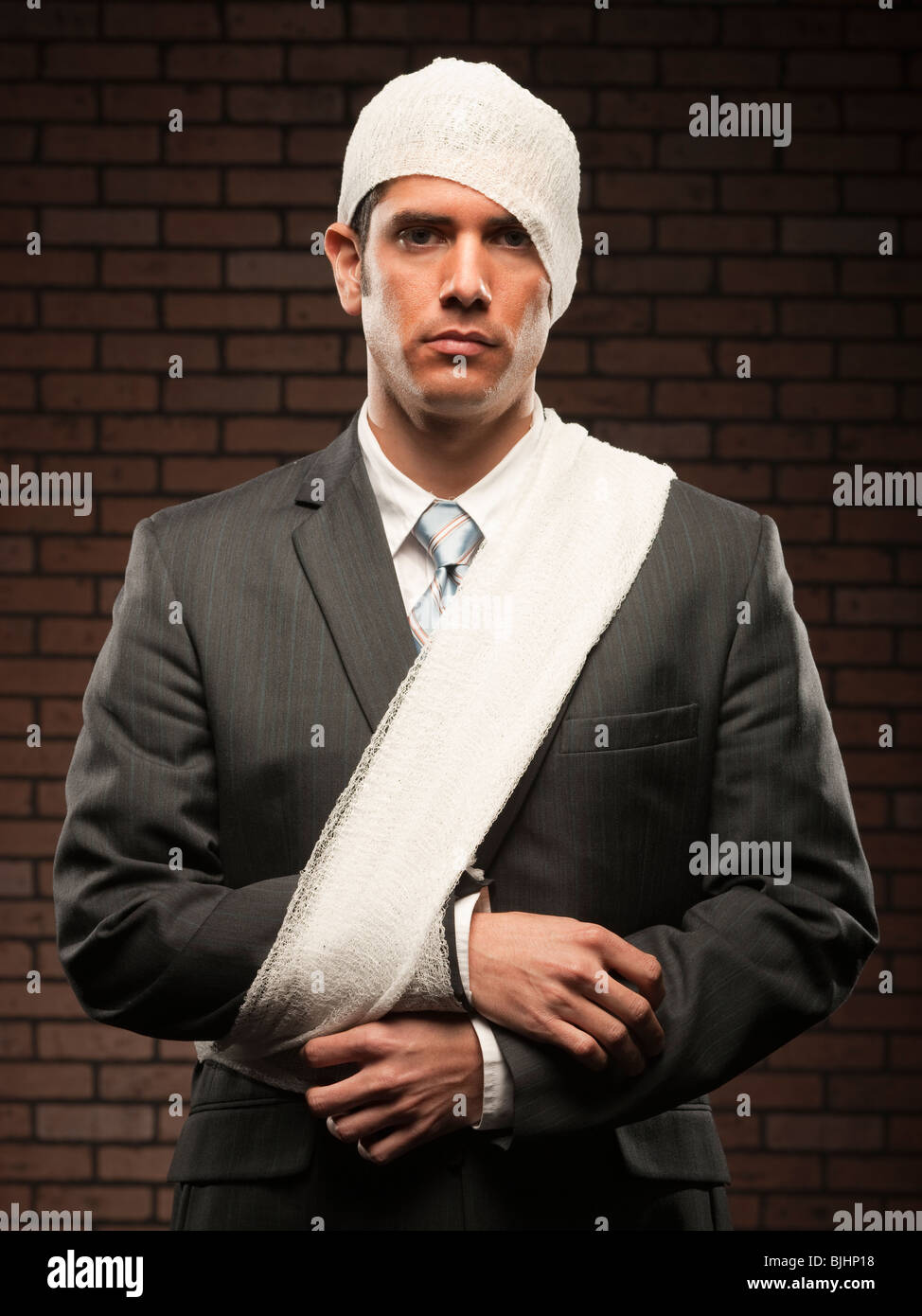 businessman with bandages on Stock Photo