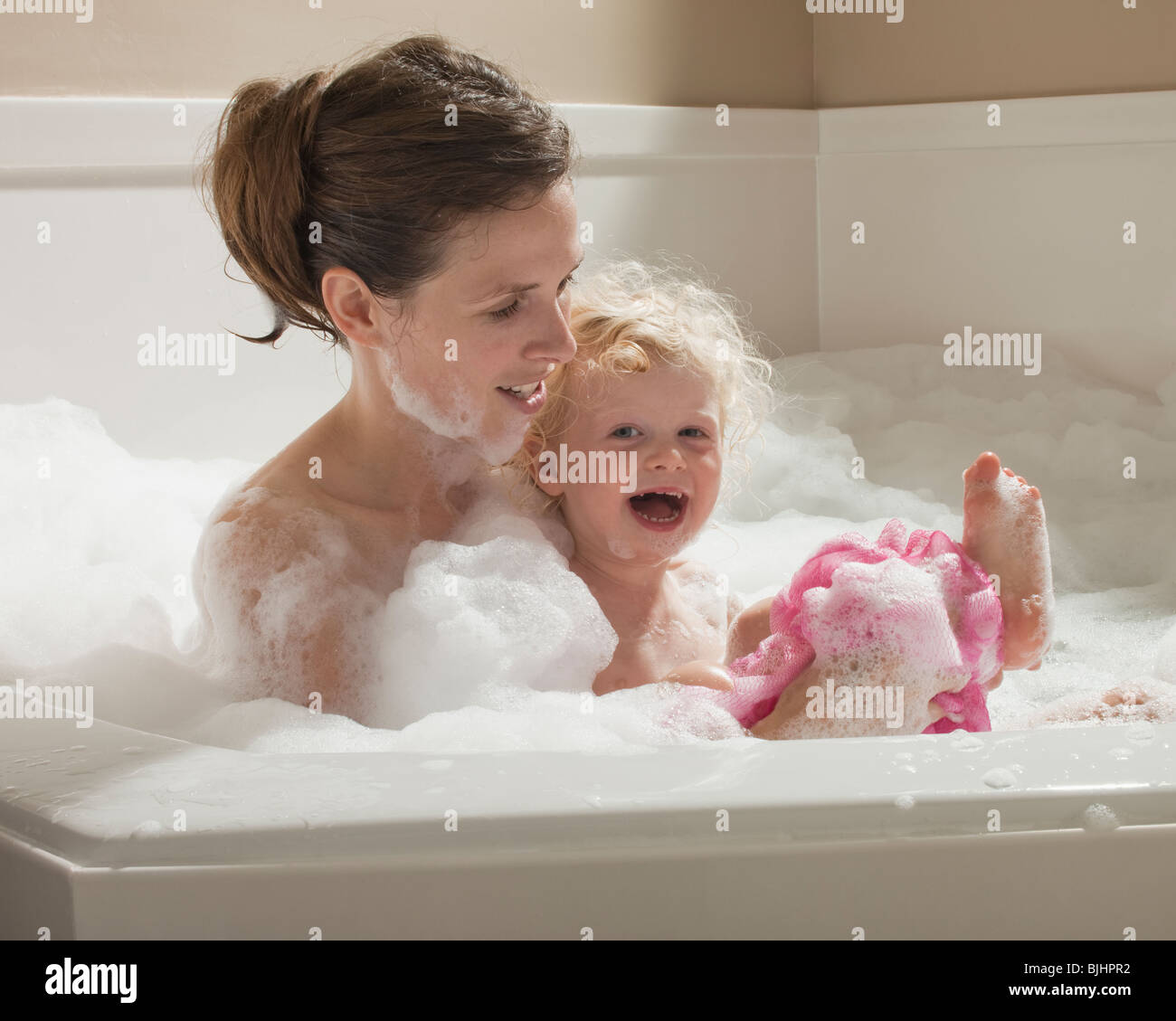 Mother and child having bubble bath Stock Photo Alamy