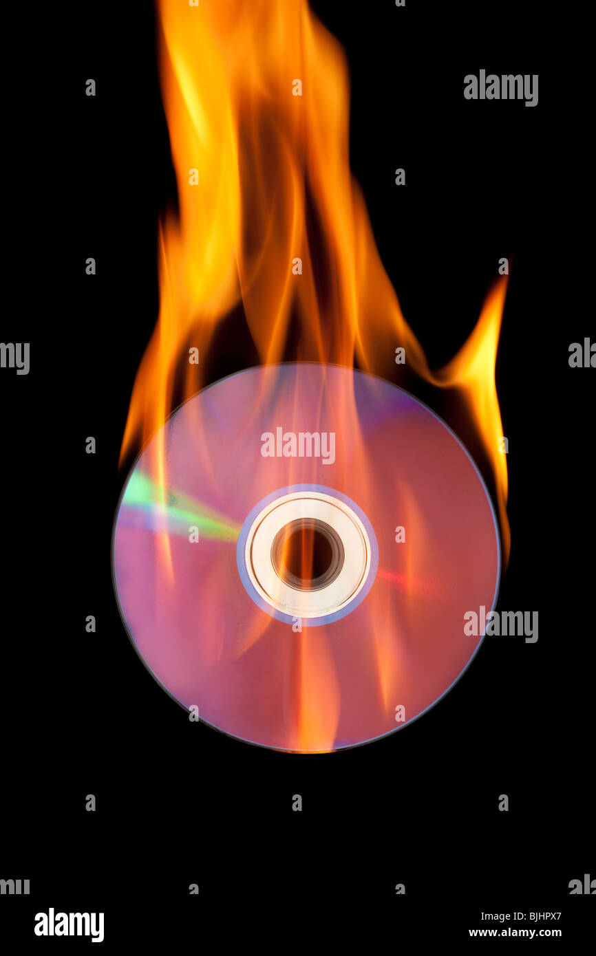 compact disk on fire Stock Photo