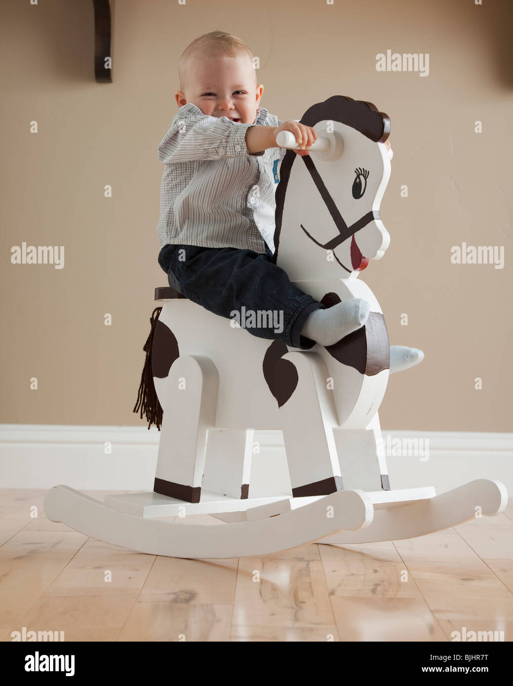 baby on rocking horse
