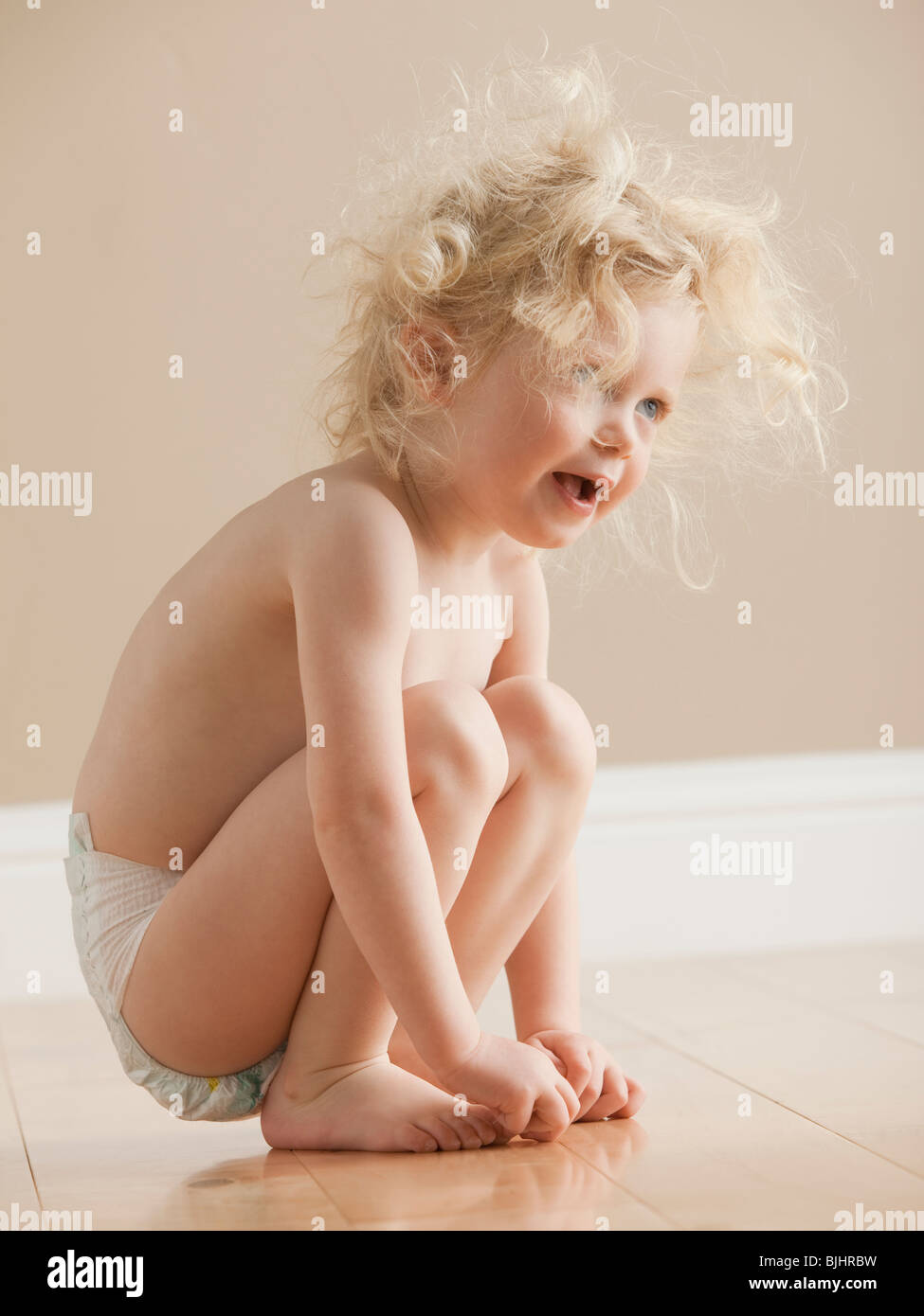 Kid in diaper Stock Photo