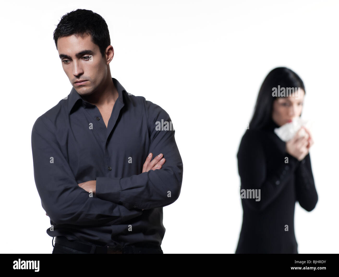 one young couple relationship difficulties dispute with woman crying on studio isolated white background Stock Photo