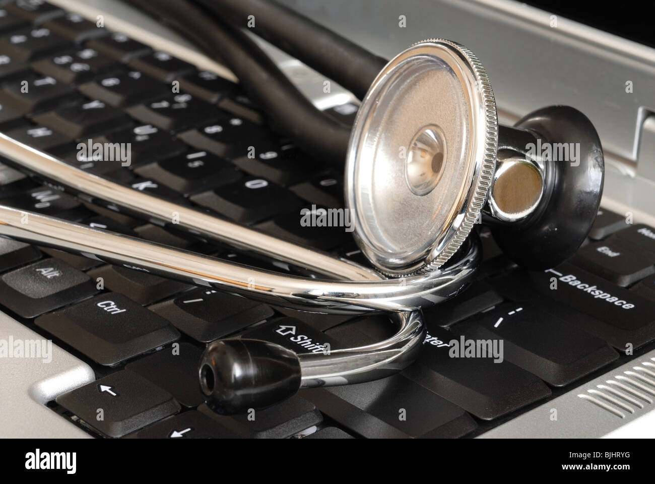 Stethoscope on Keyboard Stock Photo