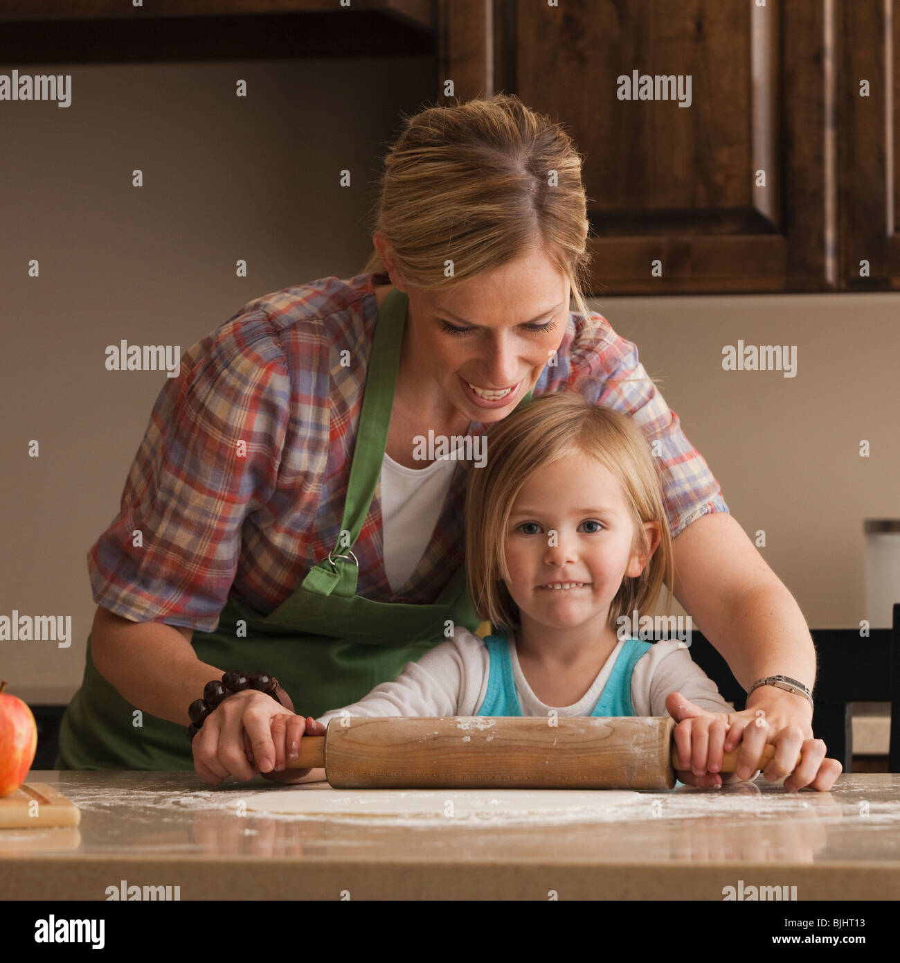 Mother and daughter baking Stock Photo Alamy